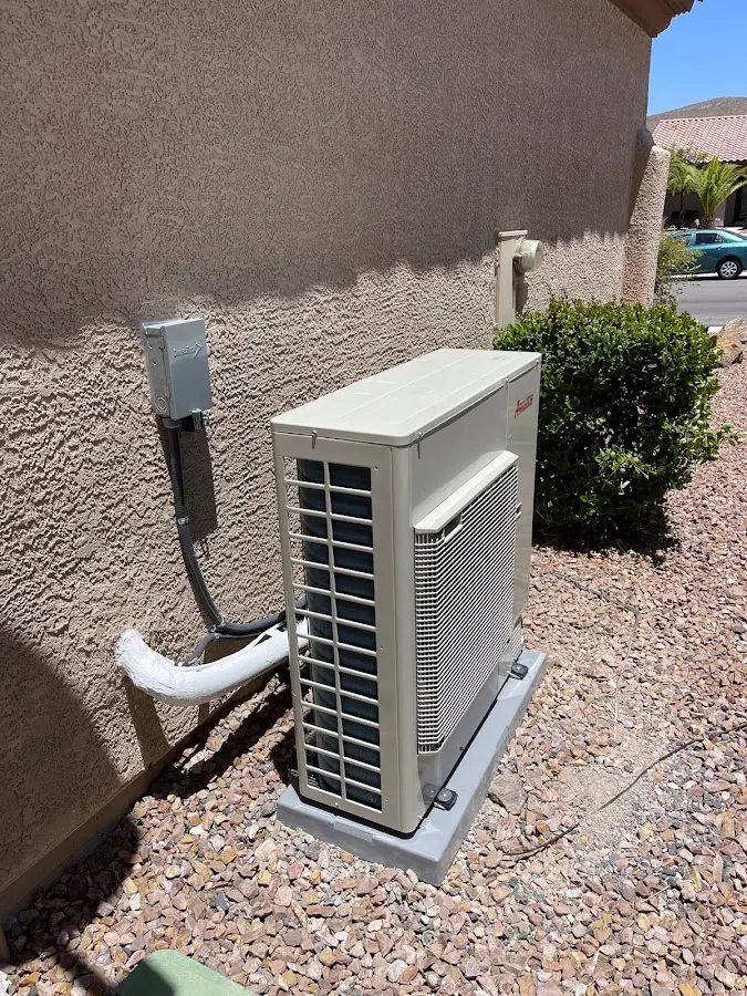 Residential air conditioning condenser unit in Laurel